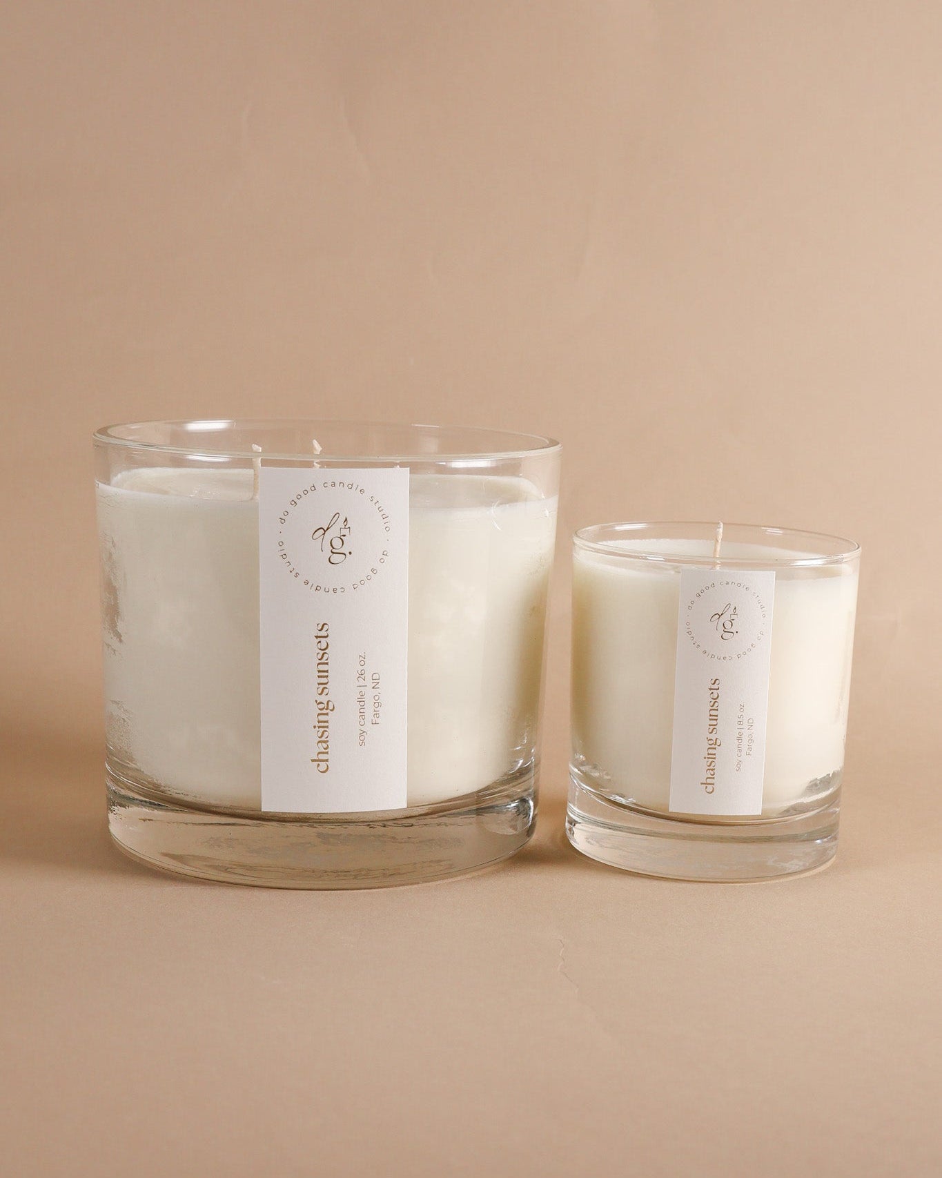 Chasing Sunsets Triple-Wick and 8.5 ounce candle on beige background