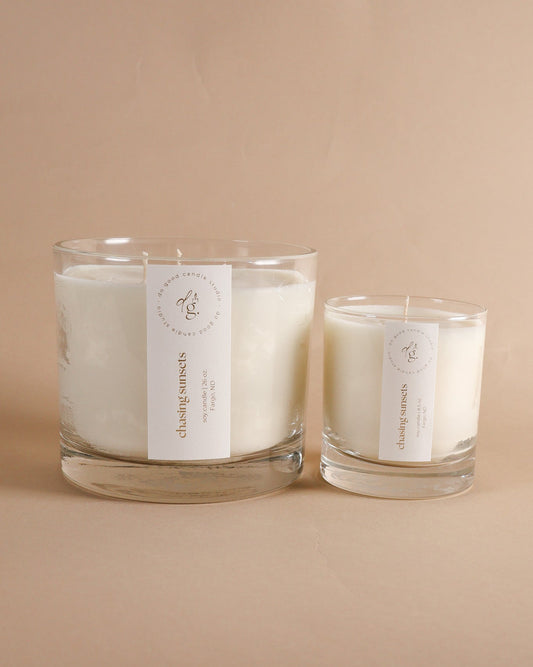 Chasing Sunsets  Triple-Wick and 8.5 ounce candle on beige background