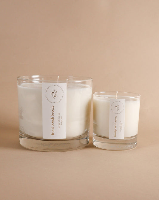 Front Porch Breeze triple wick and 8.5 ounce candle together on beige background