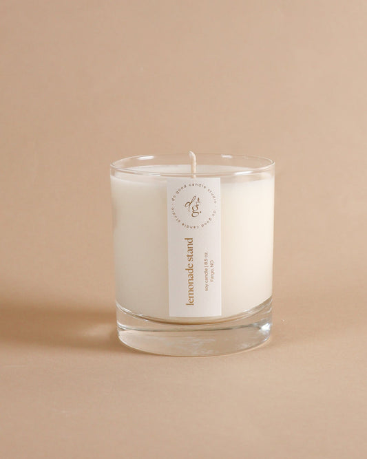 Lemonade Stand 8.5 ounce candle on beige background