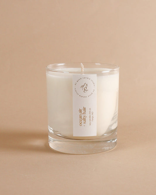 ocean air + salty hair candle on beigh backdrop