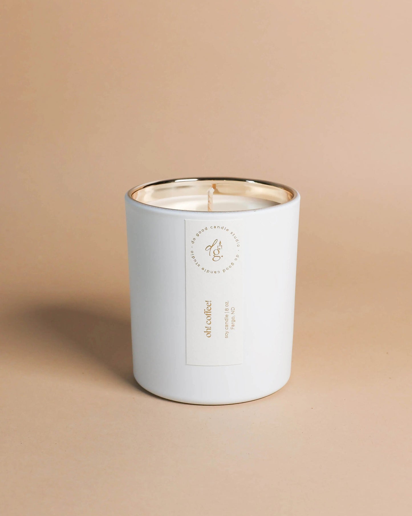 Oh! Coffee! soy candle on a beige backdrop
