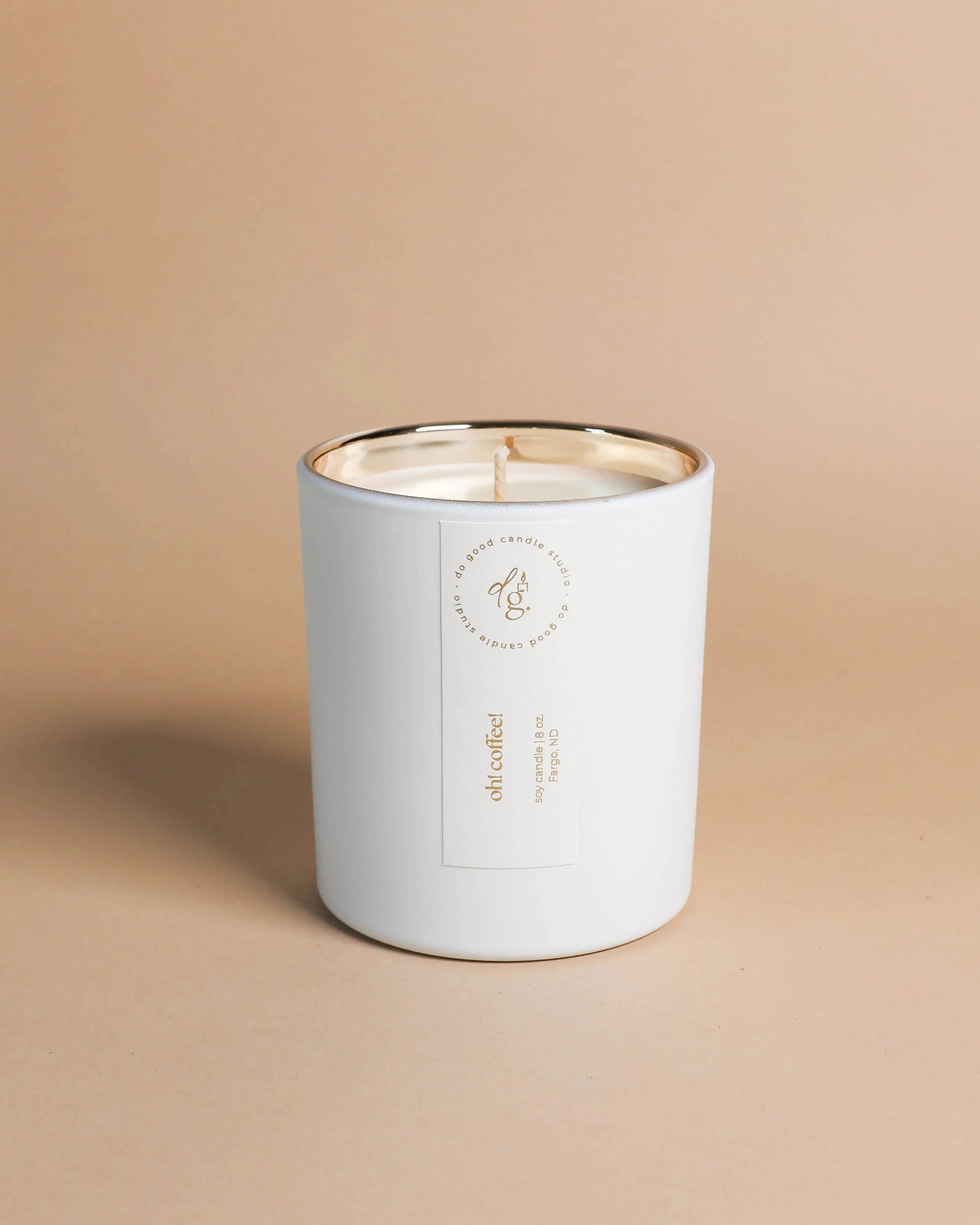 Oh! Coffee! soy candle on a beige backdrop
